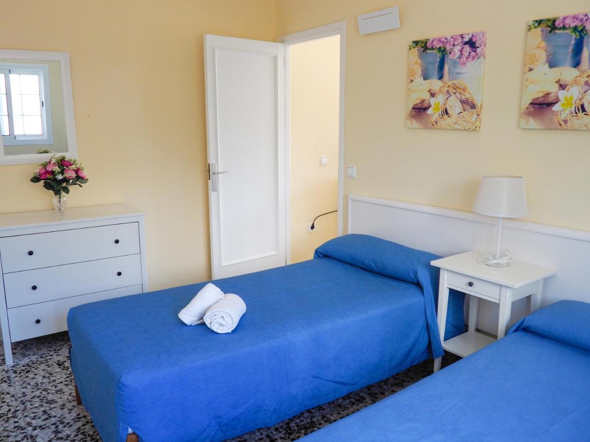 Apartamentos Cala Llonga Exteriör bild